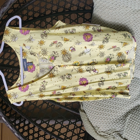 Modcloth Tops - Yellow v-neck Zodiac blouse